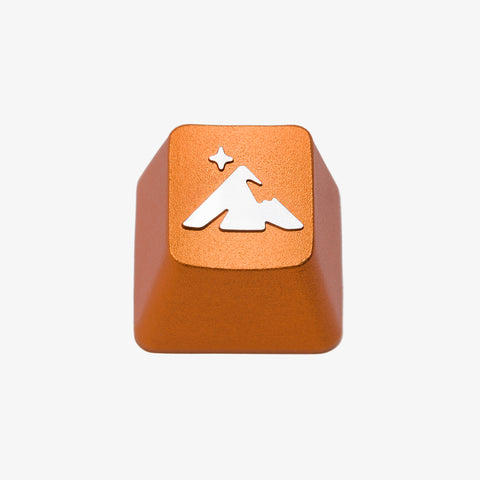 SUMMIT ARTISAN KEYCAP - front shot of orange body with silver Higround logo on top
